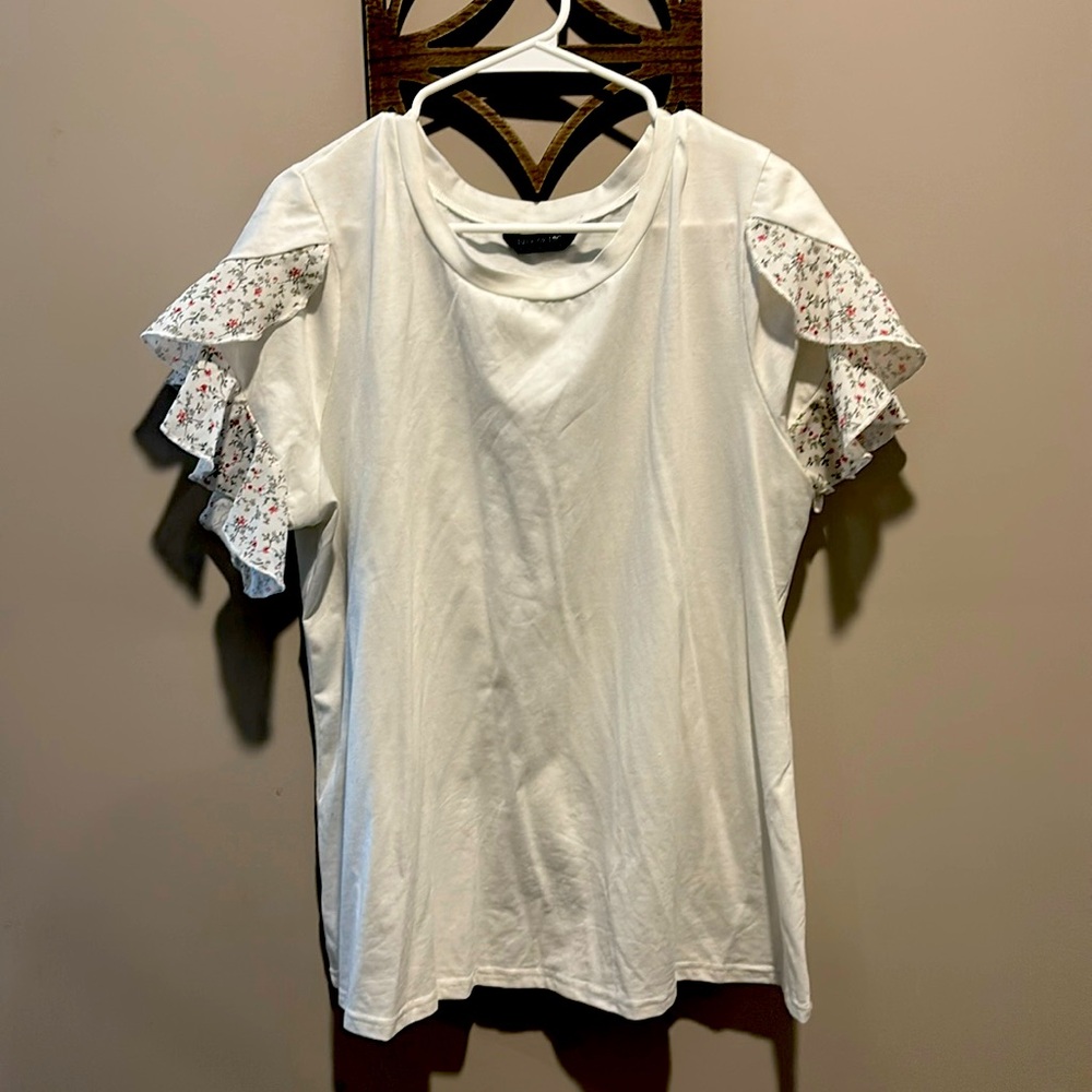 14-16 Bloom Chic White Shirt with butterfly flowered sleeves.